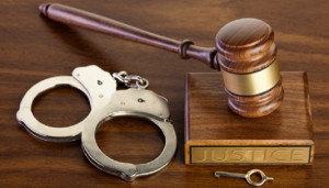 photo of gavel and handcuffs